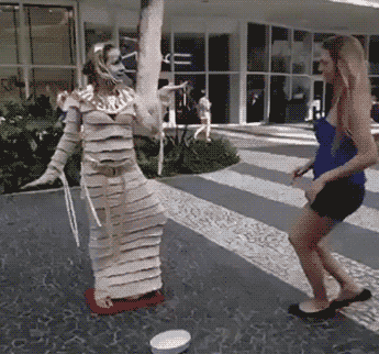 Girl gets slapped by street performer. Girl gets slapped by street performer. watch more best funny images on comedy.pk.. What does the performer yell at her?